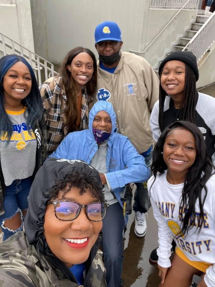 Shundra (center) with her nephew and his family.