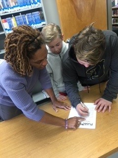 Shundra with middle school students.